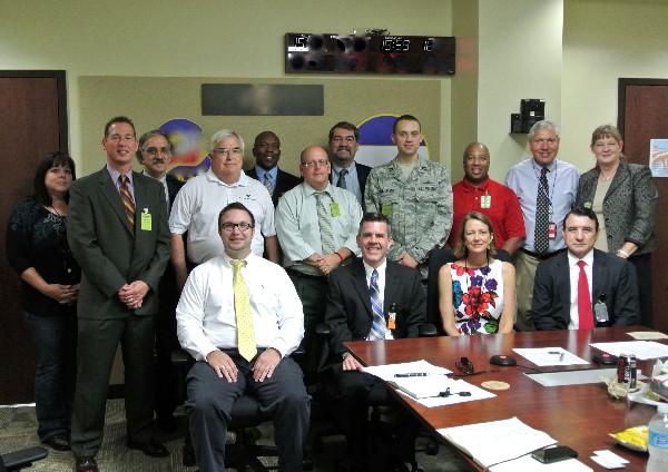 Newly inducted members of the chapter's 2012-2013 board look toward the future at the July meeting.